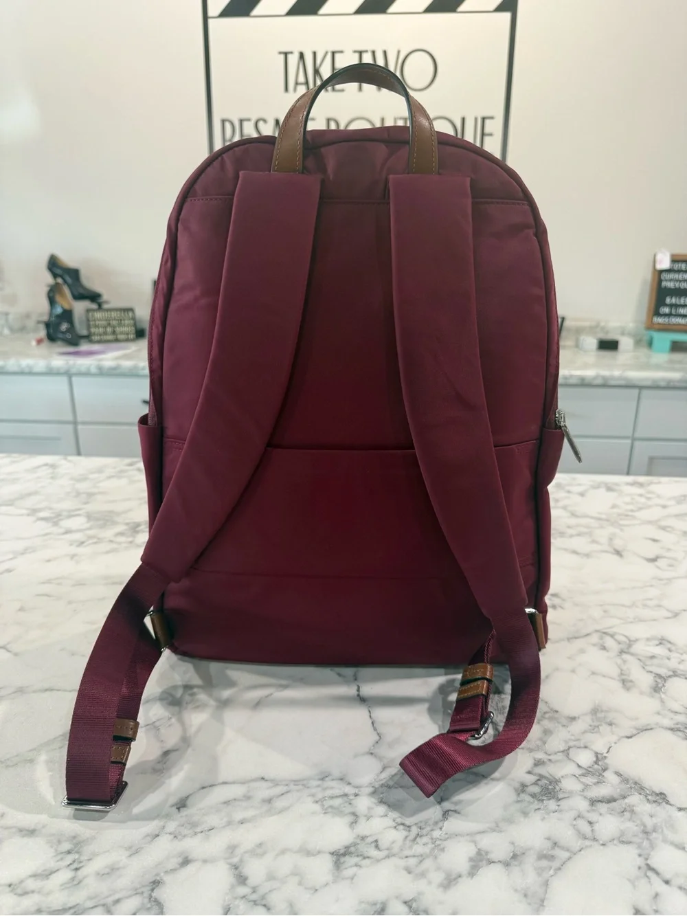 Tumi Burgundy nylon travel Backpack with several pockets